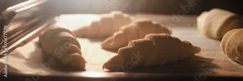 Canvas Cooking sweet tasty croissants in oven closeup