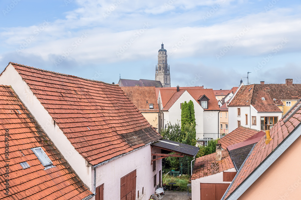 Nördlingen, Germany. Tiled roofs and the tower of the cathedral dominating the city Nördlingen, Germany. Tiled roofs and the tower of the cathedral dominating the city