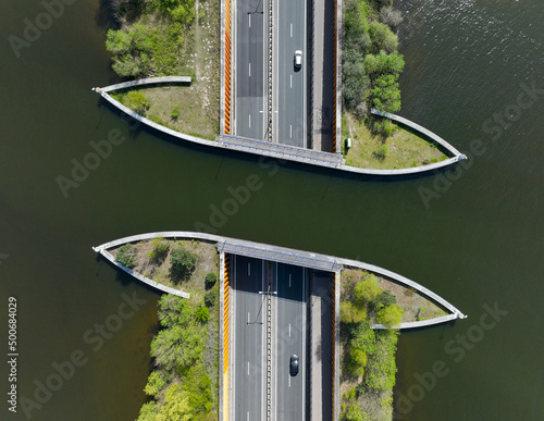Leinwand Poster Aquaduct Veluwemeer water bridge above highway traffic, Aerial view