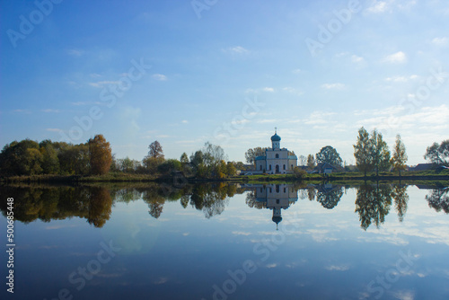 reflection of trees in the lake, orthodox church 