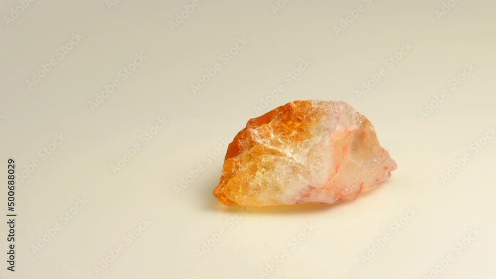 Citrin gemstone on a turn table Citrin gemstone on a turn table