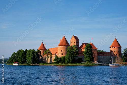 Trakai Island Castle in lake Galve with boats in summer day, Lithuania. Trakai Castle is one of major tourist attractions of Lituania