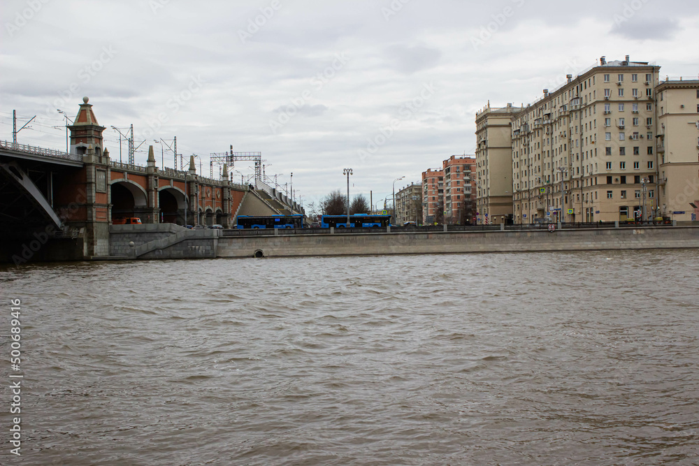 Fototapeta premium Beautiful view of the city river and architecture buildings