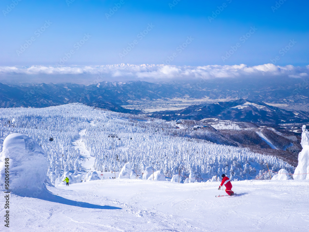 Skiing in a snow monsters (soft rime) plateau (Zao-onsen ski resort, Yamagata, Japan)