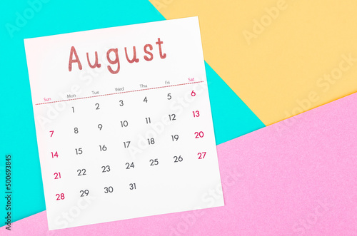 August 2022 calendar on multicolored background.