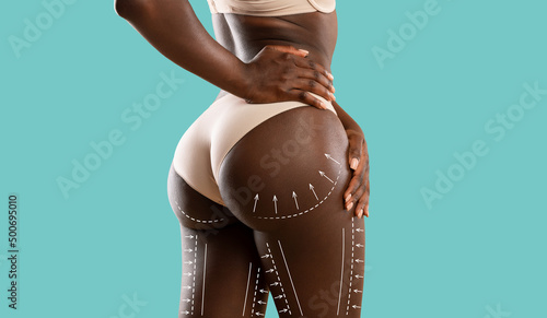 Closeup of african american woman in panties showing slender body