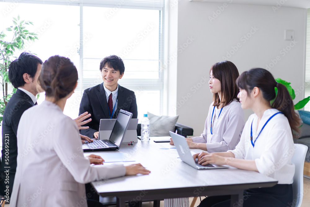 Office workers having a business meeting Office workers having a business meeting