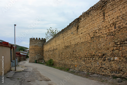 Old walls of the fortress in the town of Signagi, Georgia photo