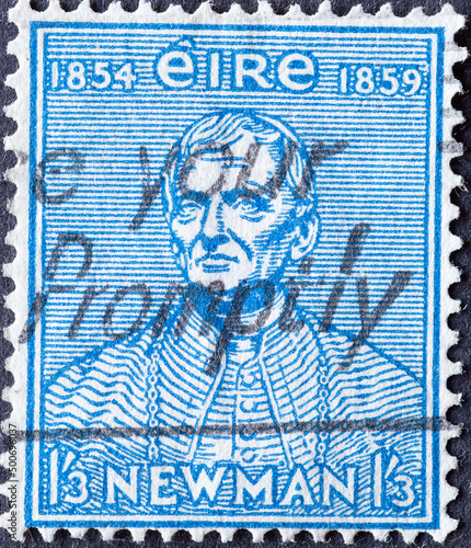 Ireland - circa 1954: a postage stamp from Ireland, showing the portrait of the rector of the Catholic University, John Henry Newman photo