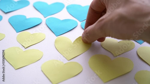 Yellow-blue hearts on a white background