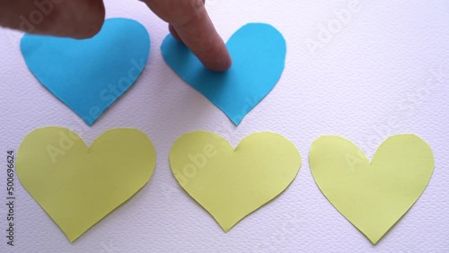 Yellow-blue hearts on a white background