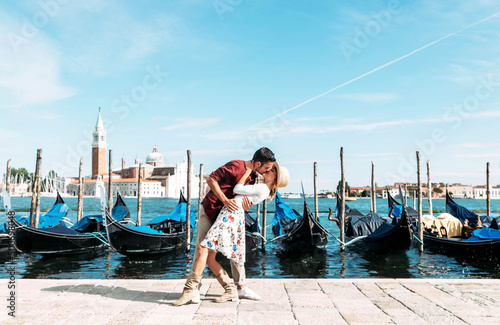 Couple of lovers visiting Venice, Italy - Boyfriend and girlfriend having romantic italian weekend © Davide Angelini