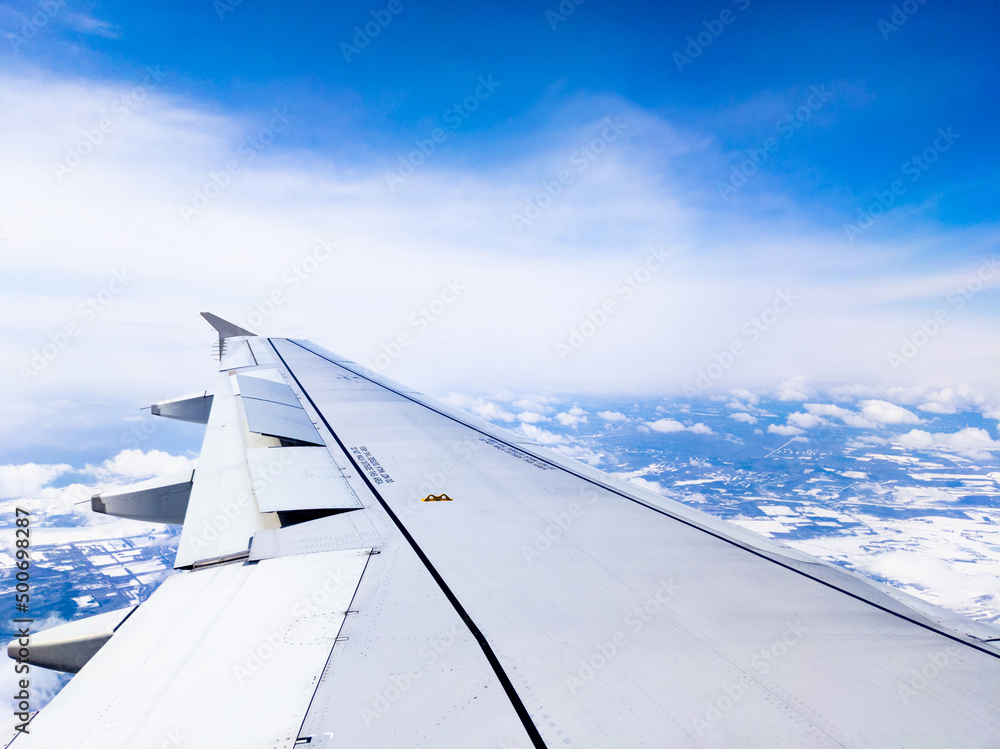 Fototapeta premium Snowy town viewed from an airplane (Atsuma, Hokkaido, Japan)
