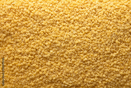 Fotografie italian pasta background, small star-shaped pasta