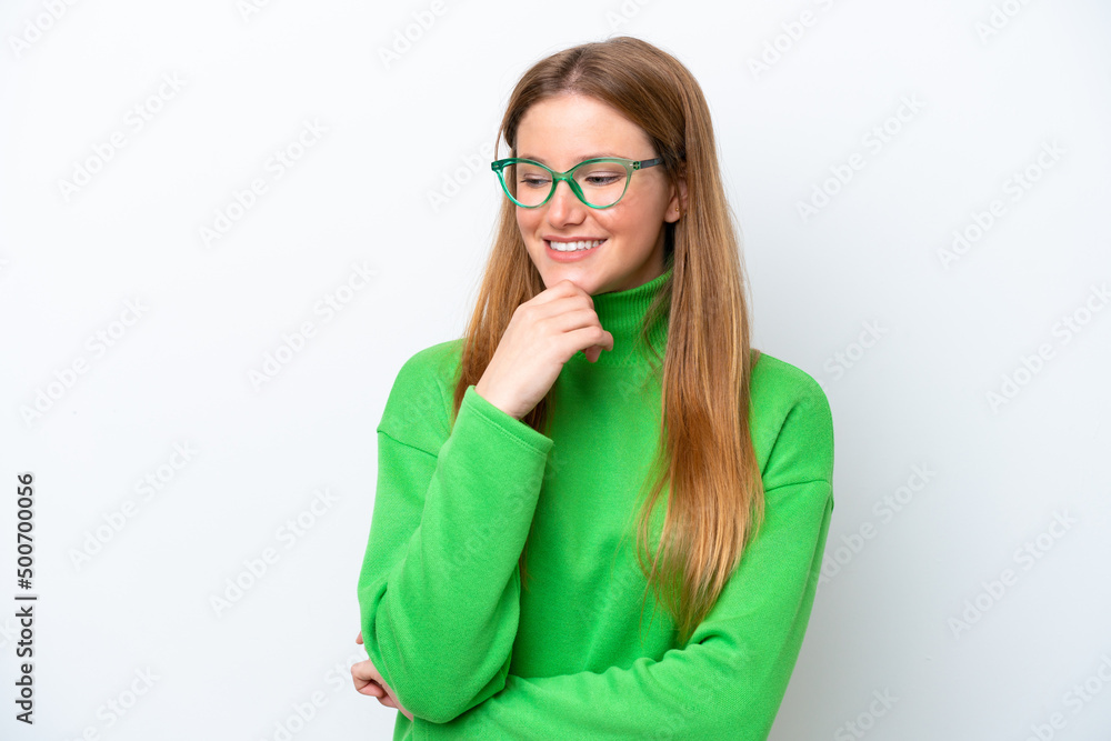 Young caucasian woman isolated on white background looking to the side and smiling Young caucasian woman isolated on white background looking to the side and smiling