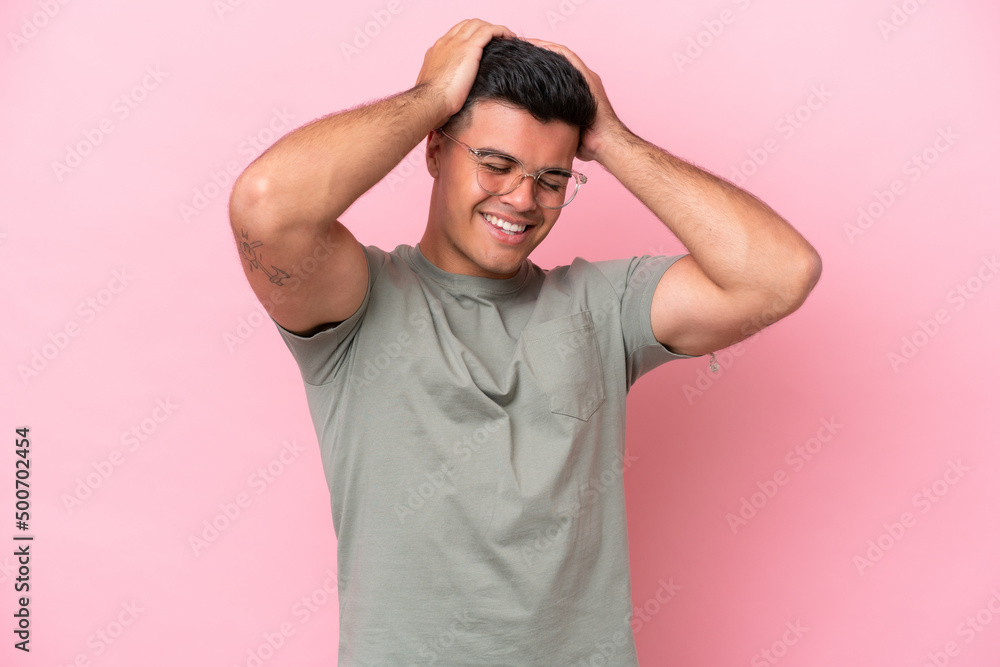 Young caucasian handsome man isolated on pink background laughing Young caucasian handsome man isolated on pink background laughing