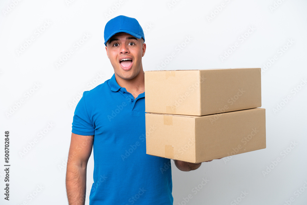 Delivery caucasian man isolated on white background with surprise facial expression Delivery caucasian man isolated on white background with surprise facial expression