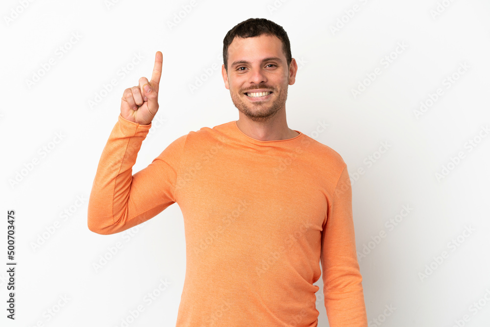 Fototapeta premium Brazilian man over isolated white background pointing up a great idea