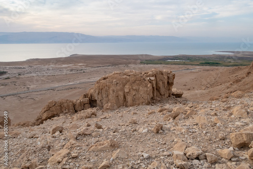 View from a mountain near the Tamarim stream on the Israeli side of the Dead Sea at sunrise over the Dead Sea and over the mountains on the Jordan side near Jerusalem in Israel