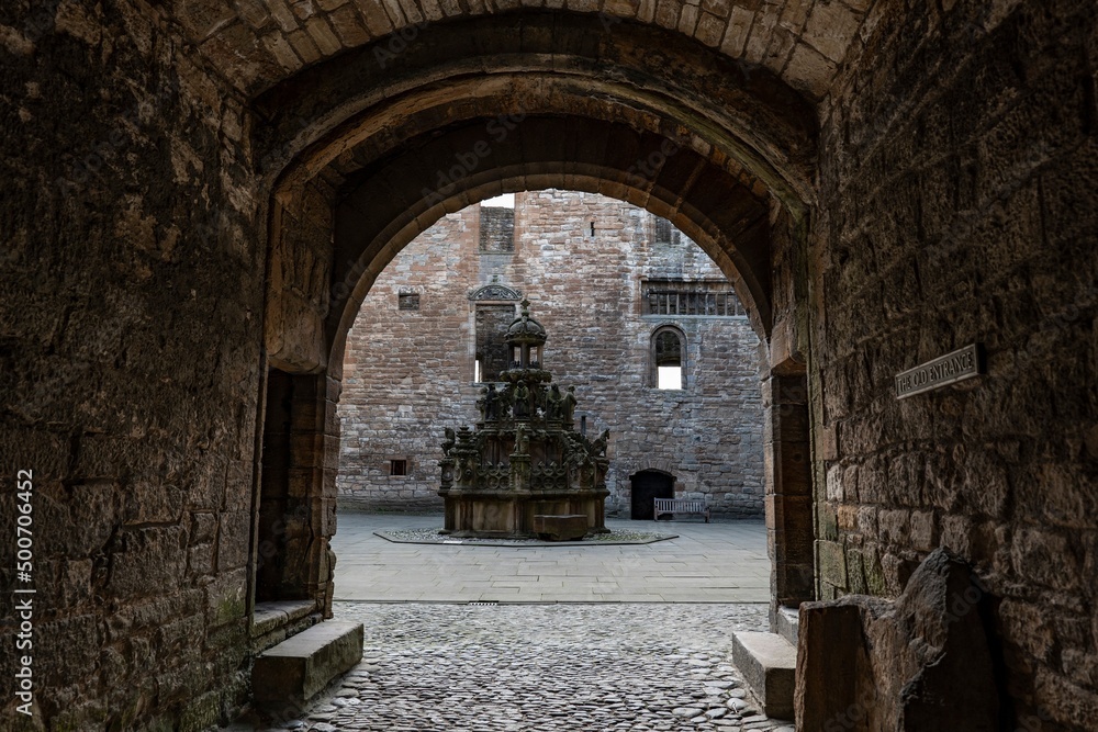 Fototapeta premium The Old Entrance to counrtyard of Linlithgow Palace with Kings Fountain, Scotland