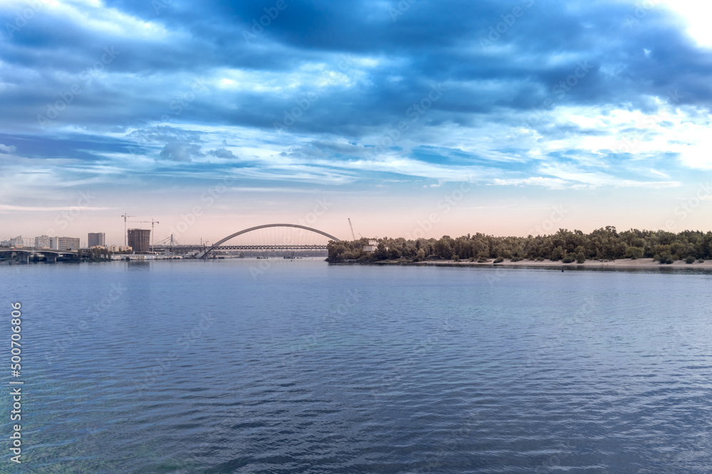 Bridge over the Dnieper river. Wide river Dnieper in Kyiv