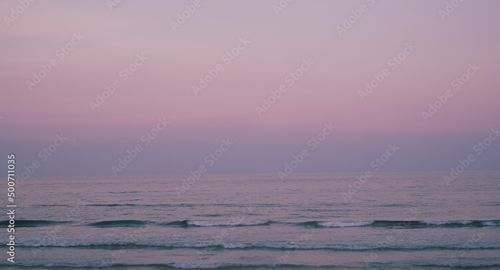 Beautiful relaxing sunset beach. Beautiful cloudscape over the sea at sunset. Ocean beach sunset with deep blue sky. Beautiful relaxing sunset beach. Beautiful cloudscape over the sea at sunset. Ocean beach sunset with deep blue sky.