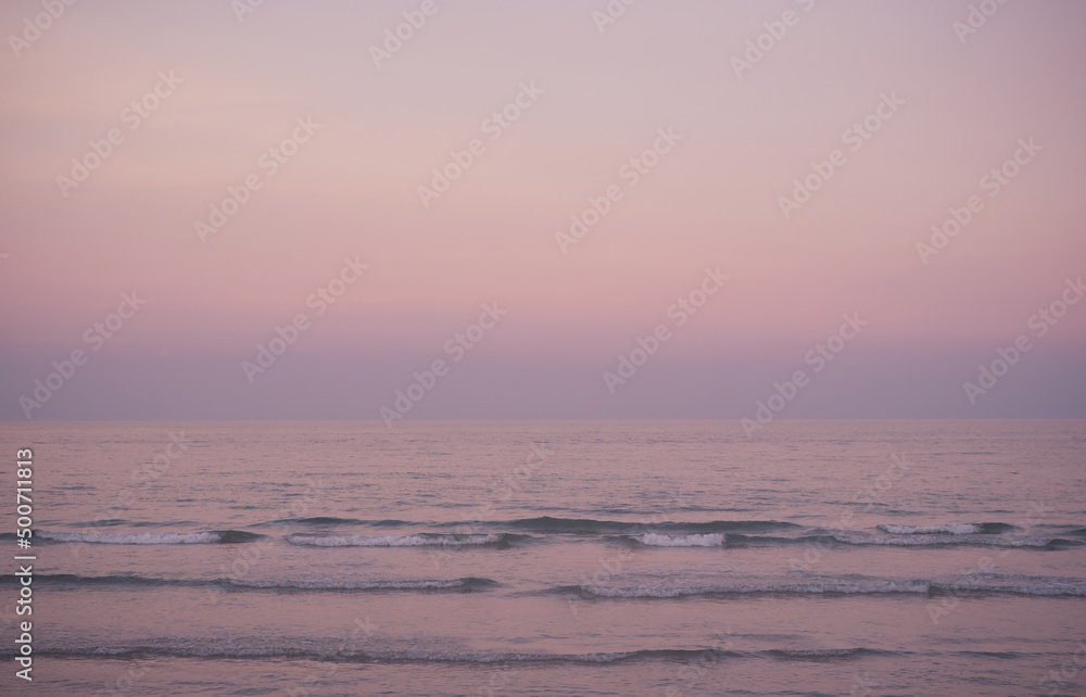 Beautiful relaxing sunset beach. Beautiful cloudscape over the sea at sunset. Ocean beach sunset with deep blue sky. Beautiful relaxing sunset beach. Beautiful cloudscape over the sea at sunset. Ocean beach sunset with deep blue sky.