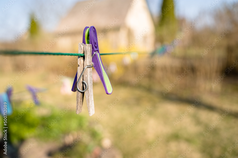 Abstract Concept of House Chores, Blurred Clothes Pegs Hanging Abstract Concept of House Chores, Blurred Clothes Pegs Hanging