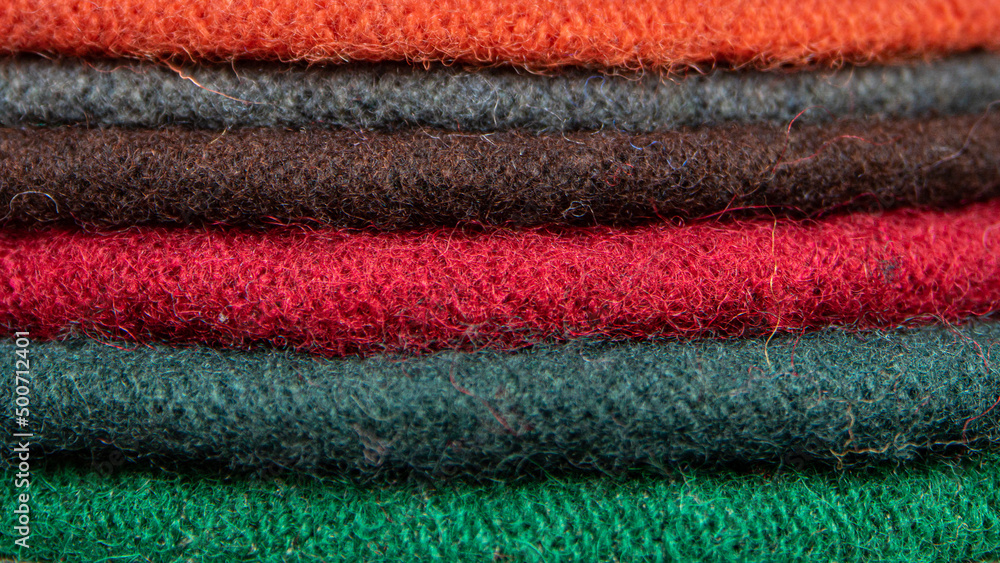 Close-up colors, dark wool, line background Close-up colors, dark wool, line background