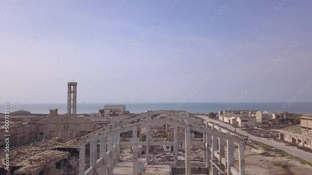 Abandoned Electro-Chemical plant buildings on a city coastline. Abandoned Electro-Chemical plant buildings on a city coastline.