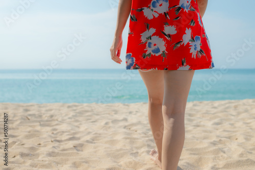 Portrait beautiful young asian woman relax walking leisure around sea beach ocean with white cloud on blue sky in travel vacation © stcom
