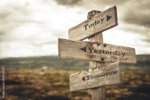 today yesterday tomorrow text quote written in wooden signpost outdoors in nature Fototapeta