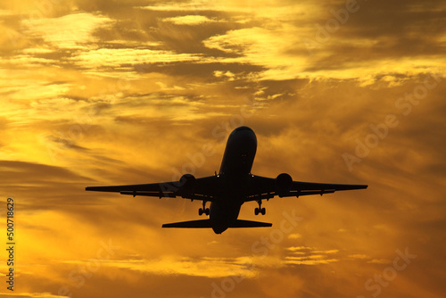 airplane at sunset