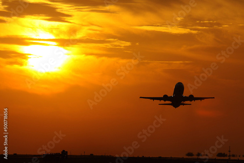 airplane at sunset