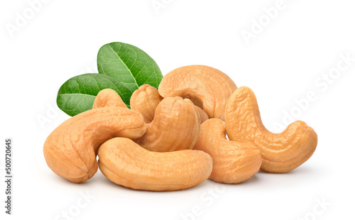 Obraz na plátne Roasted cashew nuts with leaves isolated on white background.