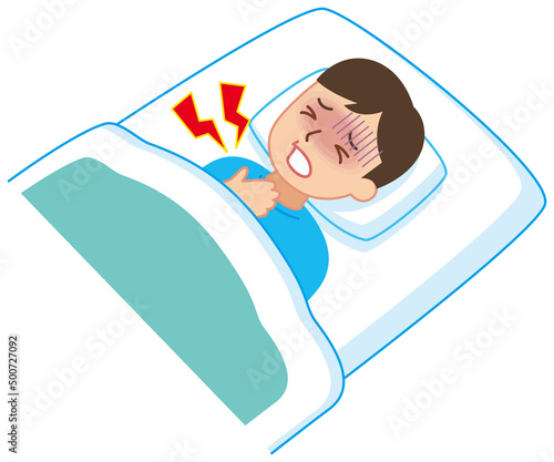 苦しそうな男性　布団