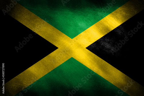 The flag of Jamaica on a retro looking background