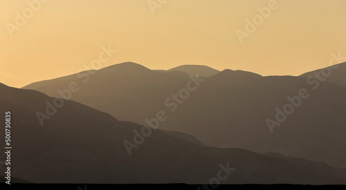 Sunset in the mountains. Ni...