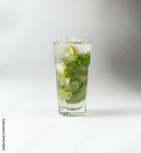 Classic mojito cocktail. On a light background.