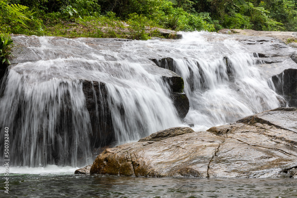 Fototapeta premium Waterfall of the Ribeirão de Itu river in Boicucanga in the Atlantic Forest in the state of São Paulo - Brazil