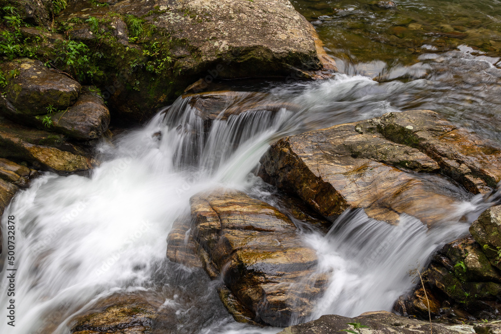 Fototapeta premium Waterfall of the Ribeirão de Itu river in Boicucanga in the Atlantic Forest in the state of São Paulo - Brazil