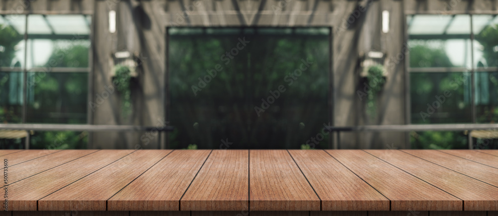 Empty wooden table top with lights bokeh on blur restaurant background. - obrazy, fototapety, plakaty 
