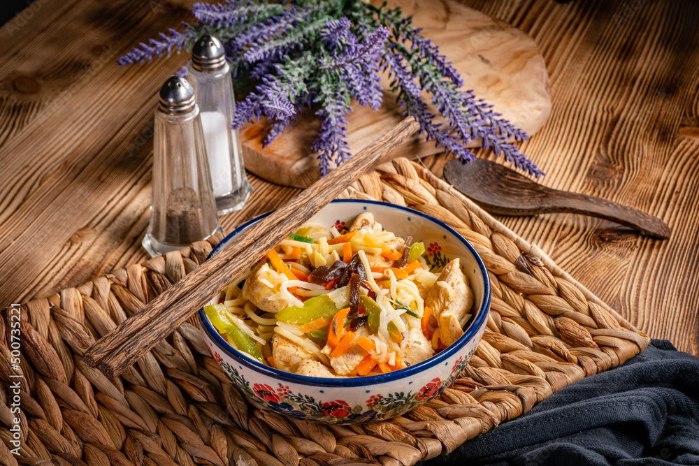 Fried noodles with chicken and vegetables. Fried noodles with chicken and vegetables.