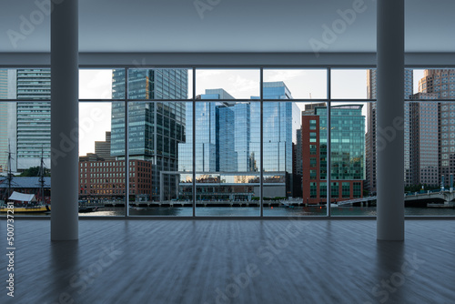 Panoramic picturesque city view of Boston at sunset from modern empty room interior, Massachusetts. An intellectual, technological and political center. 3d rendering. © VideoFlow