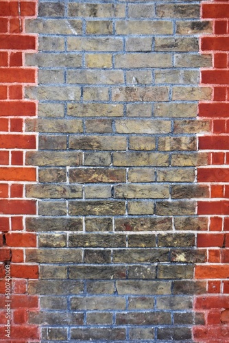 Close up of grey and red bricks