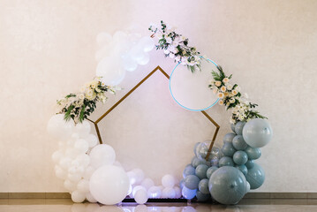 Wedding arch. Birthday decorations - balloons, garland and decor for party on a wall background. Celebration baptism concept. Trendy autumn decor.