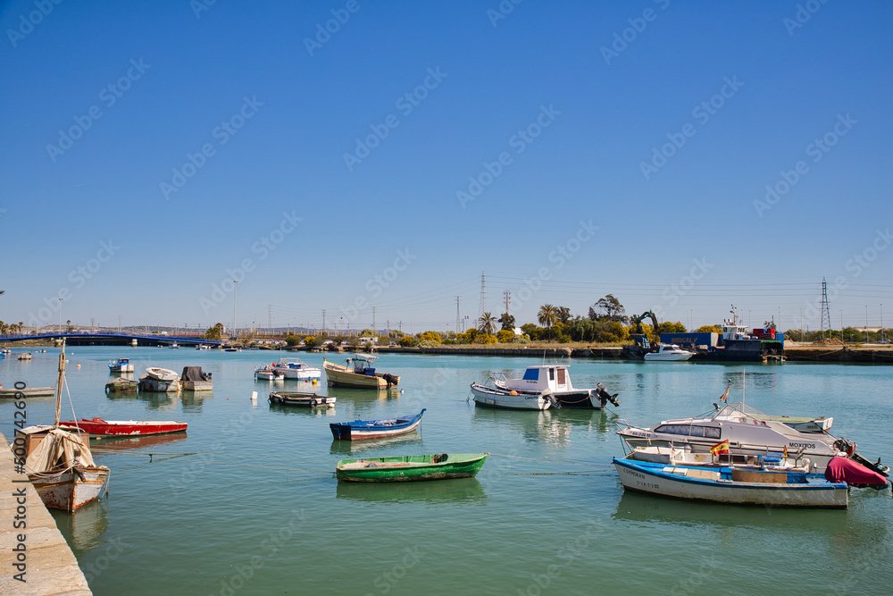 Old wooden boats anchored in a river