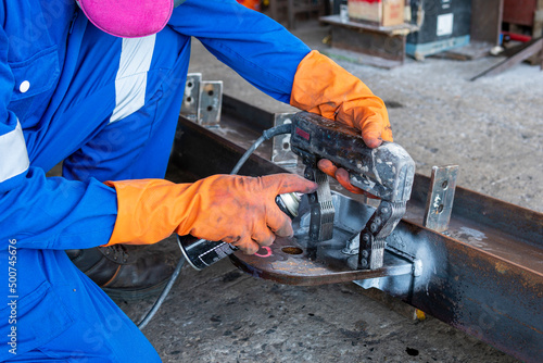 Checking defect in welded with process Magnetic Particle Testing(MT) of Non-Destructive Testing(NDT) at industrial factory.
