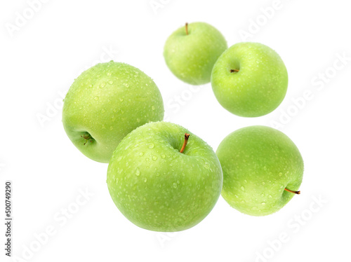 Green apples with water droplets isolated on white background.