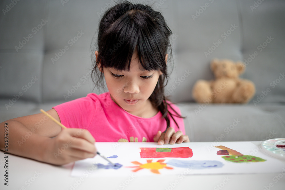 Girl Painting Picture On Table At Home Girl Painting Picture On Table At Home